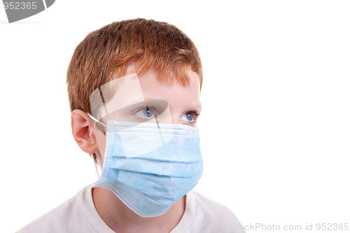 Image of young boy with a medical mask