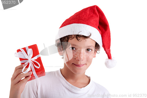 Image of Cute christmas boy with a red gift