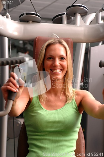 Image of pretty woman in fitness center