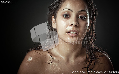Image of Portrait of beautiful young woman with wet face