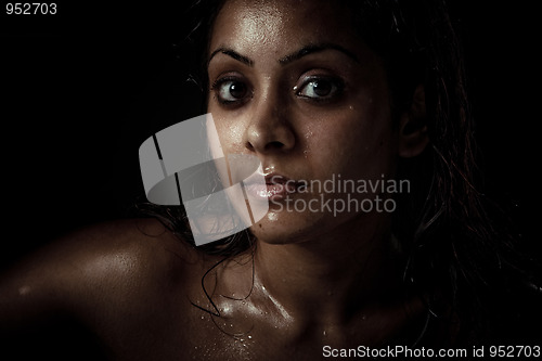 Image of Portrait of beautiful young woman with wet face
