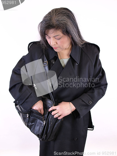 Image of Mexican Female in Overcoat
