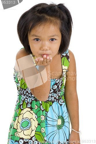 Image of little girl blowing a kiss