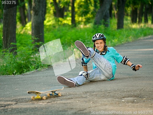 Image of Teenage girl with skateboard