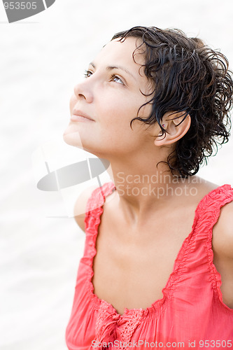 Image of brunet woman in red