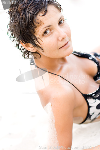 Image of woman lying on a sand