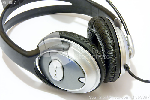 Image of Headphones with a full length wire isolated over white background