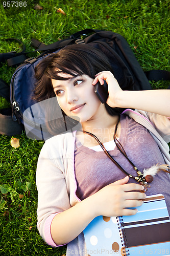 Image of Mixed race student on the phone