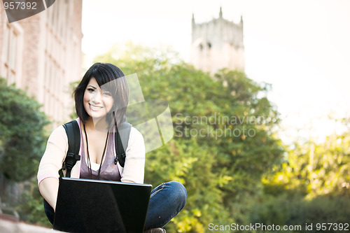 Image of Mixed race college student with laptop