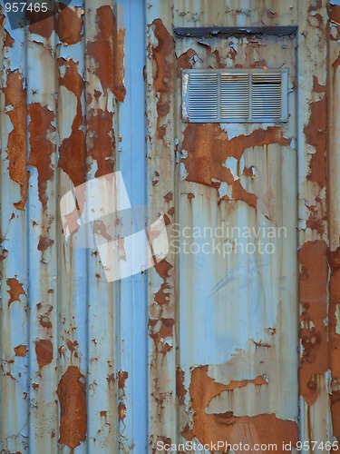 Image of Rusty Blue Door with Vent