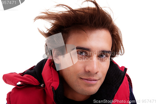 Image of Portrait of a young man with hair on the wind 
