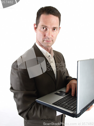 Image of Man Holding Laptop