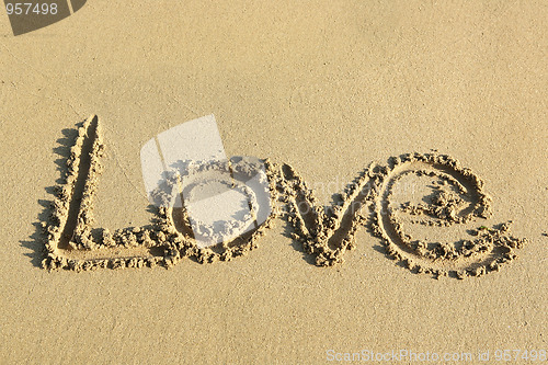 Image of love on sand