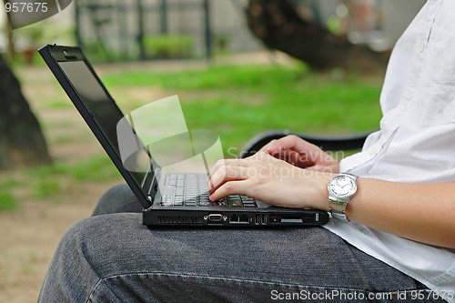 Image of work outdoor with laptop computer