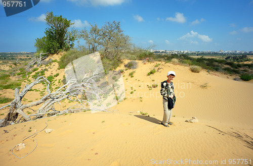 Image of Boy among the sand