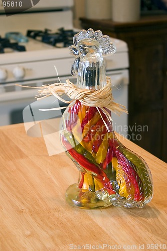 Image of Decorative Glass Hen filled with Garlic and Peppers