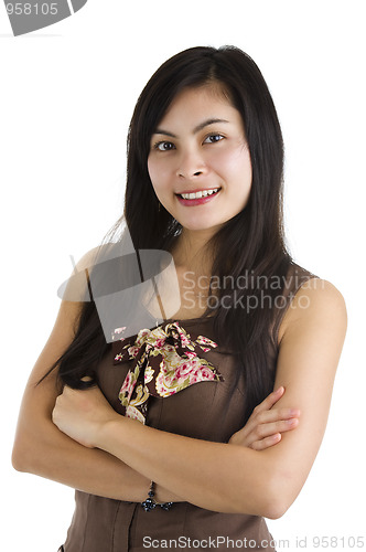 Image of confident woman with arms crossed