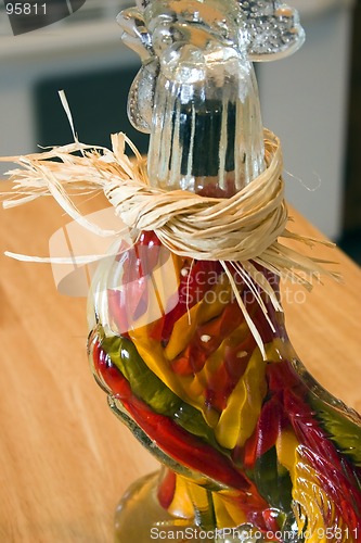 Image of Decorative Glass Hen filled with Garlic and Peppers