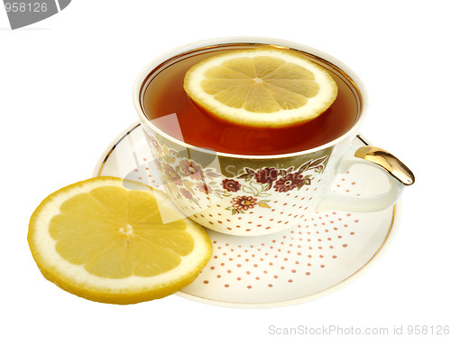 Image of A cup of tea and slices of lemon