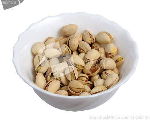 Image of Pistachios on a plate, isolated