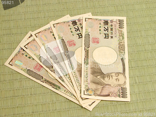 Image of Japanese money on tatami floor