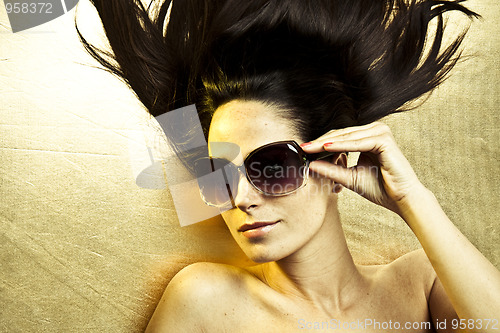 Image of gold sunglasses
