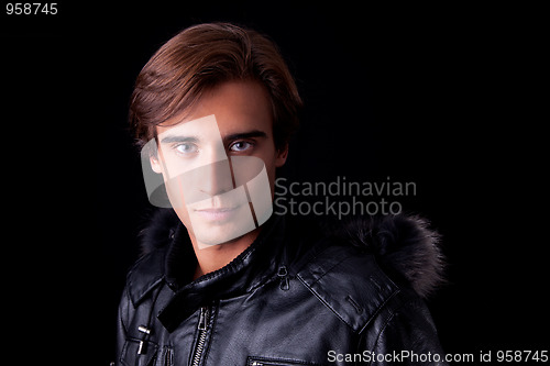 Image of Portrait of a young man, in autumn/winter clothes, 