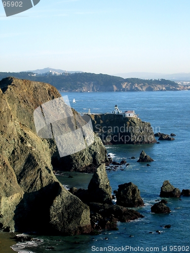 Image of cliff with a lighthouse