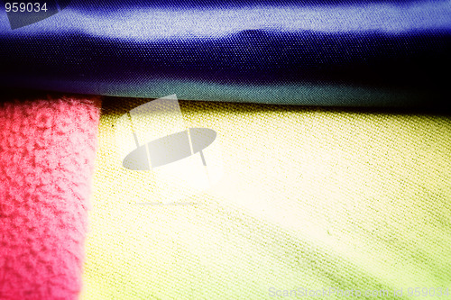 Image of Yellow, pink and blue blanket