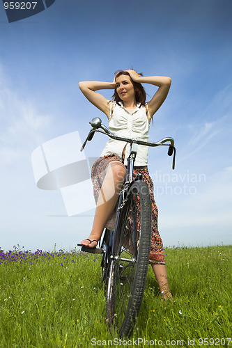 Image of Girl with a bicycle