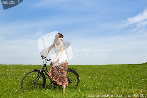 Image of Girl with a bicycle