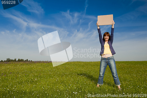 Image of Girl with a paper card