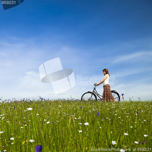 Image of Girl with a bicycle