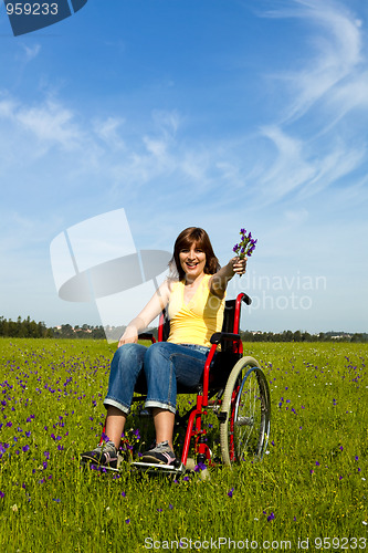Image of Handicapped woman on wheelchair