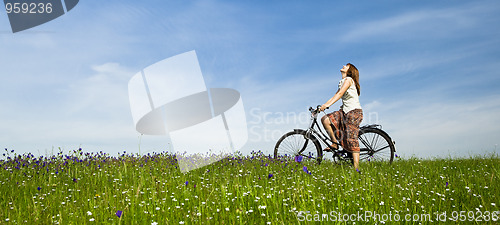 Image of Girl with a bicycle