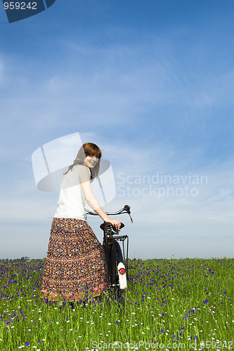 Image of Girl with a bicycle