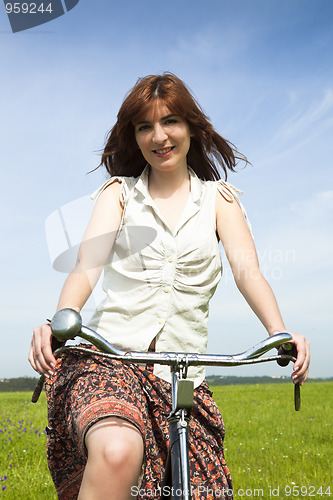 Image of Girl with a bicycle