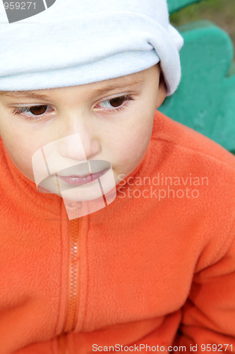Image of Kid in orange closeup