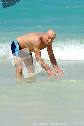 Image of Senior man in water