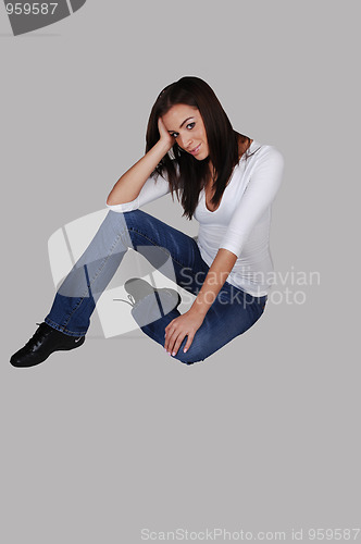 Image of Smiling girl on the floor.