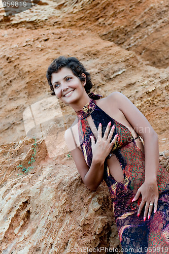 Image of woman in brown dress