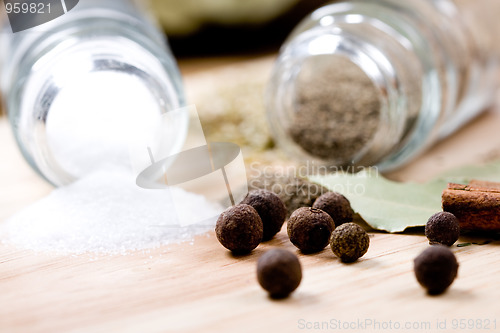 Image of spices on wooden background 