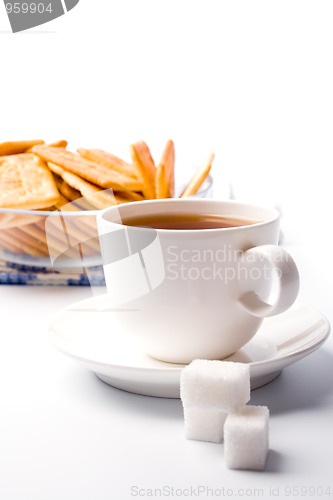Image of tea, sugar and cookies