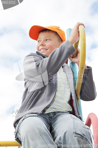 Image of Boy on climbing staircase looking sideways