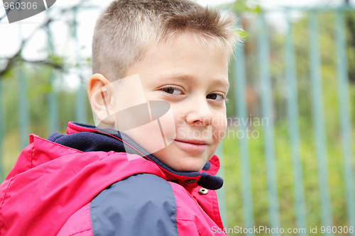 Image of Cute boy turned head