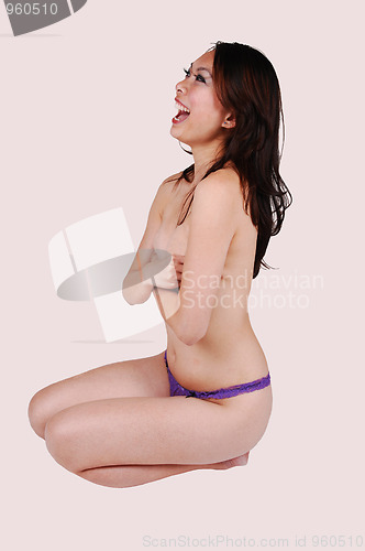 Image of Chinese girl laughing in nude.