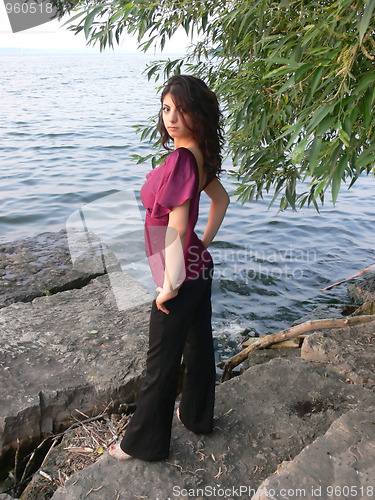 Image of Young girl in pink blouse  