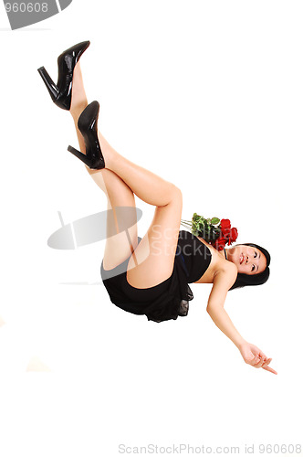 Image of Chinese girl lying on the floor.