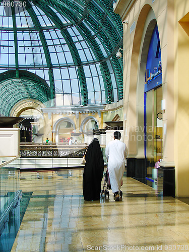 Image of Arab family shopping in supermarket in Dubai