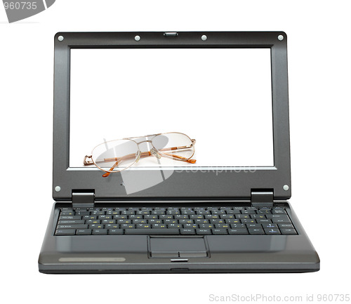 Image of laptop with eyeglasses